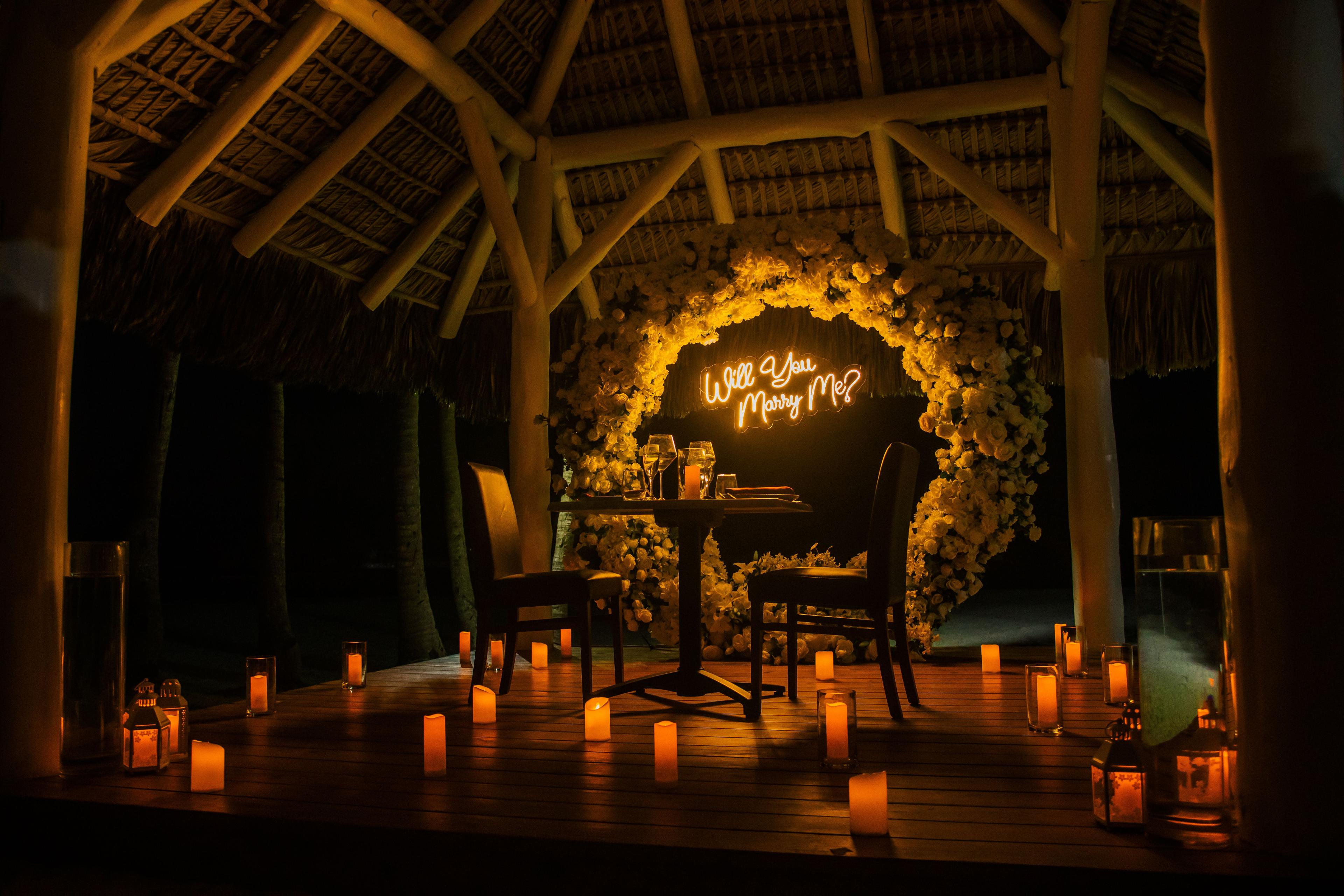 Romantic dinner proposal setup on the beach in Punta Cana